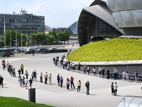 Queues outside the vaccination centre at Glasgow's Hydro in early June. Picture: John Devlin