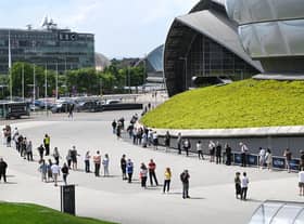 Queues outside the vaccination centre at Glasgow's Hydro in early June. Picture: John Devlin