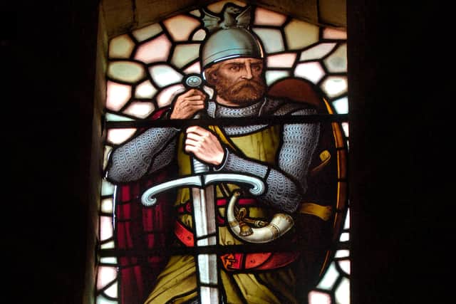A stained glass window of Wallace inside his monument in Stirling.