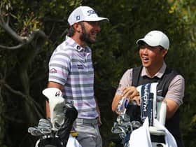 American Max Homa and Tom Kim of South Korea share a laugh during The Genesis Invitational at Riviera Country Club in Los Angeles in February. Picture: Harry How/Getty Images.