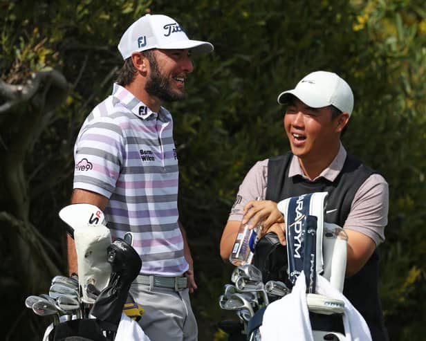 American Max Homa and Tom Kim of South Korea share a laugh during The Genesis Invitational at Riviera Country Club in Los Angeles in February. Picture: Harry How/Getty Images.