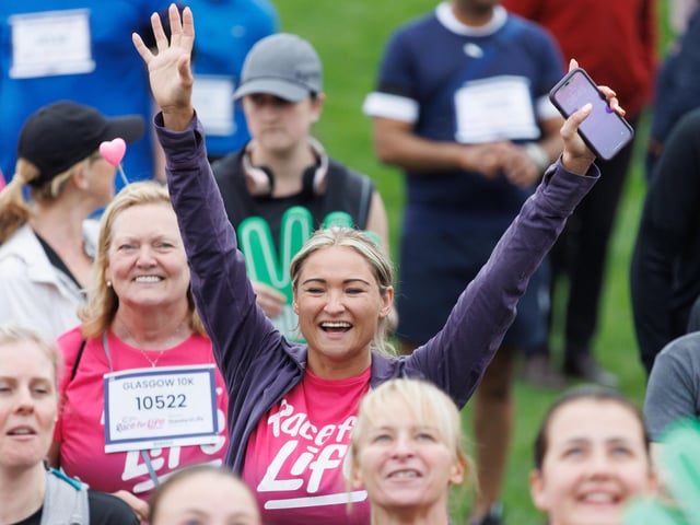Feeling on top of the world at the Glasgow Race for Life. PIC: Steve Welsh.
