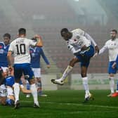 Kilmarnock's Kicke Kabamba has a shot saved by St Johnstone defence, as appeals for a handball are made.