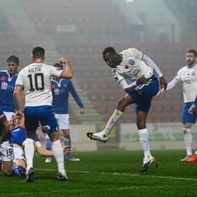 Kilmarnock's Kicke Kabamba has a shot saved by St Johnstone defence, as appeals for a handball are made.