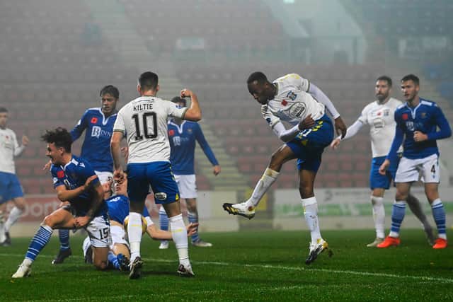 Kilmarnock's Kicke Kabamba has a shot saved by St Johnstone defence, as appeals for a handball are made.