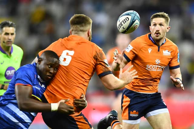 Luke Crosbie of Edinburgh offloads the ball to Henry Pyrgos during the URC quarter-final defeat to Stormers in Cape Town. (Photo by Ashley Vlotman/Gallo Images_