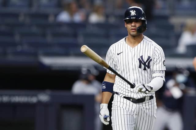 Gleyber Torres of the New York Yankees tosses his bat after hitting a home run against the Boston Red Sox. Picture: Noah K. Murray/AP