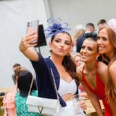 Friends Jenna, Roxane and Ellie capture the day in the first of many selfies