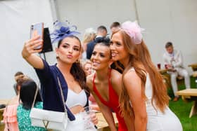 Friends Jenna, Roxane and Ellie capture the day in the first of many selfies