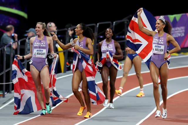(L-R) Bronze medalists Jessie Knight, Lina Nielsen, Ama Pipi and Laviai Nielsen of Team Great Britain celebrate after the Women's 4x400 Metres Relay Final.