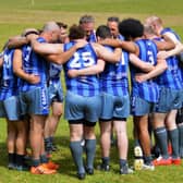 The Kingdom Kangaroos huddle at half time during one of their matches in 2022. Picture: John Kinninmonth