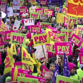 Members of the Educational Institute of Scotland (EIS) join teachers at a rally outside the Scottish Parliament in Edinburgh in a protest over pay. Picture date: Thursday November 24, 2022.