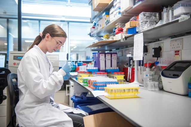 A researcher in a laboratory at the Jenner Institute working on the coronavirus vaccine developed by AstraZeneca and Oxford University. PA Photo.