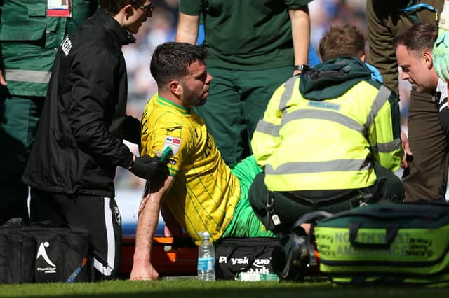 Grant Hanley is stretchered off after picking up an injury while playing for Norwich City against Blackburn Rovers at Ewood Park.