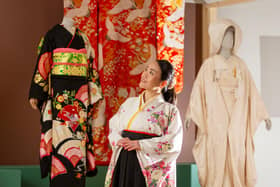 Calligraphy artist Tomoko Rowell has a close look at the exhibition Kimono: Kyoto to Catwalk, which will run at V&A Dundee from 4 May until 5 January. Picture: Michael McGurk