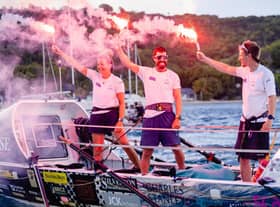 Taylor, Tom and James celebrate their world record setting achievement