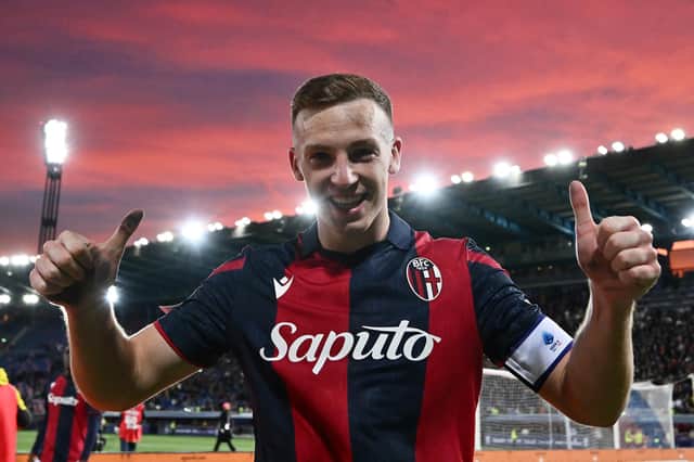 Lewis Ferguson celebrates after scoring the late winner in a 1-0 victory Atalanta at Stadio Renato Dall'Ara. (Photo by Alessandro Sabattini/Getty Images)