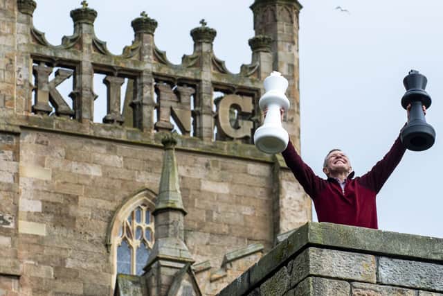 Scottish Liberal Democrat Leader Willie Rennie frolics at Dunfermline Abbey, where he announced his party's plans to raise the starting age for formal schooling