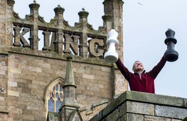 Scottish Liberal Democrat Leader Willie Rennie frolics at Dunfermline Abbey, where he announced his party's plans to raise the starting age for formal schooling