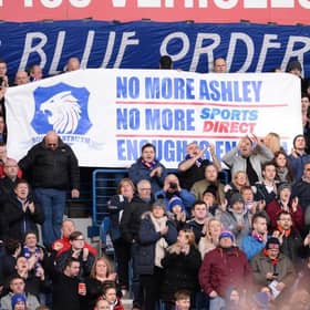 Rangers supporters display their opposition to Mike Ashley's involvement in the club during a match at Ibrox in March 2016. (Photo by Rob Casey/SNS Group).