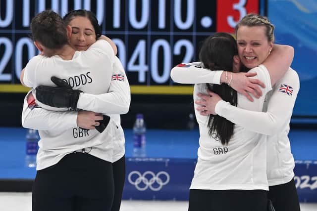 From left, Britain's Jennifer Dodds, Britain's Eve Muirhead, Britain's Hailey Duff and Britain's Vicky Wright celebrate after winning the women's gold medal game of the Beijing 2022 Winter Olympic Games.