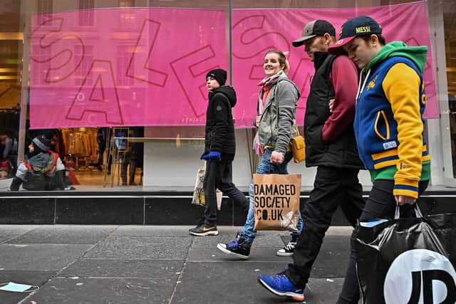 Members of the public are seen shopping during the Boxing Day sales in Glasgow. Picture: Jeff J Mitchell/Getty Images