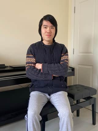 Pok sitting at his piano at his home in South Queensferry picture: Wang Pok Lo