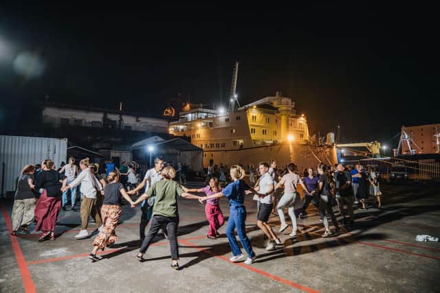 Over 100 crew members from around 30 countries joined in the ceilidh on the dockside by the Mercy Ship.