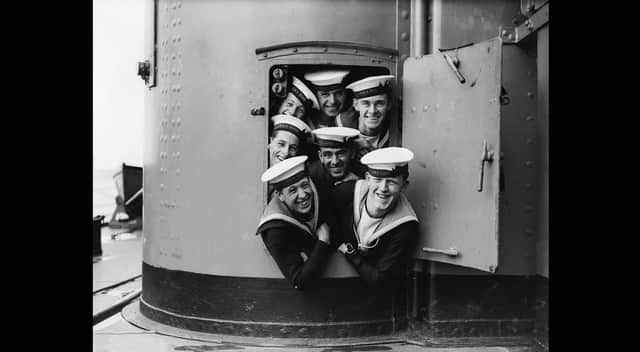 A group of sailors pose for a picture aboard HMS Hood during naval manoeuvres in September 1928 (Picture: Fox Photos/Getty Images)