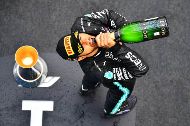 Lewis Hamilton celebrates his Eifel Grand Prix win at Nurburgring.