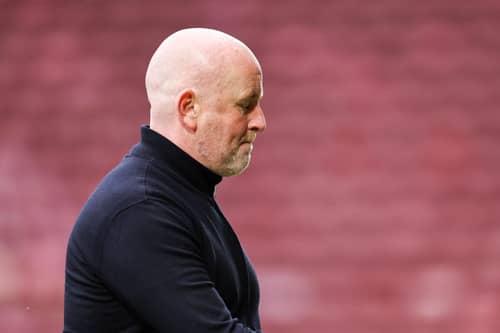 Livingston manager David Martindale looks dejected following the 4-1 defeat at Motherwell that confirmed his side's relegation. (Photo by Ross MacDonald / SNS Group)