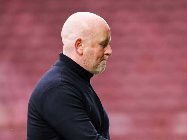Livingston manager David Martindale looks dejected following the 4-1 defeat at Motherwell that confirmed his side's relegation. (Photo by Ross MacDonald / SNS Group)