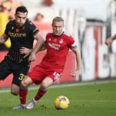 Dylan McGeouch is on the hunt for a new club after leaving Aberdeen. (Photo by Paul Devlin / SNS Group)