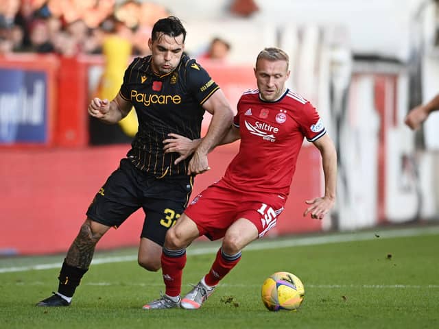 Dylan McGeouch is on the hunt for a new club after leaving Aberdeen. (Photo by Paul Devlin / SNS Group)
