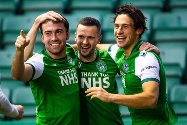 Hibs duo Steven Mallan (left) and Jamie Murphy (centre), pictured with Joe Newell, are hoping to return to action against Livingston on Saturday. (Photo by Craig Foy / SNS Group)