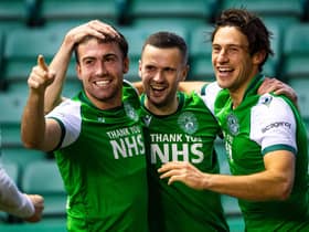 Hibs duo Steven Mallan (left) and Jamie Murphy (centre), pictured with Joe Newell, are hoping to return to action against Livingston on Saturday. (Photo by Craig Foy / SNS Group)