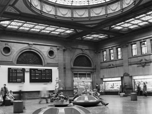 The interior of which famous Edinburgh building boasts this beautiful glass roof?
