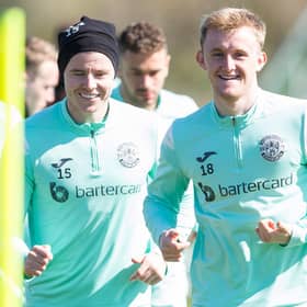 EDINBURGH, SCOTLAND - APRIL 20: Ewan Henderson (R) and Kevin Nisbet during a Hibernian training session at Hibernian Training Centre, on April 20, 2023, in Edinburgh, Scotland.  (Photo by Ewan Bootman / SNS Group)