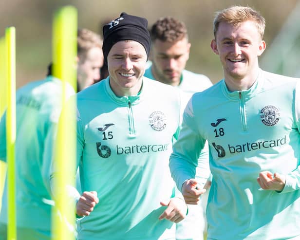 EDINBURGH, SCOTLAND - APRIL 20: Ewan Henderson (R) and Kevin Nisbet during a Hibernian training session at Hibernian Training Centre, on April 20, 2023, in Edinburgh, Scotland.  (Photo by Ewan Bootman / SNS Group)