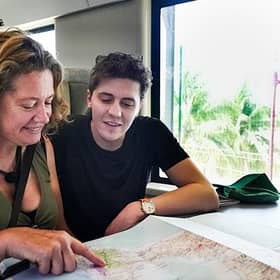 Dylan Llewellyn and mum Jackie study the map in Celebrity Race Across the World (Picture: :BBC/Studio Lambert)