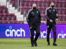Celtic manager Ange Postecoglou, left, during his first visit to Tynecastle back in July 2021.