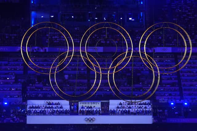 The Olympic rings are raised during the closing ceremony of the 2024 Paris Games at the Stade de France (Picture: John Walton/PA Wire)