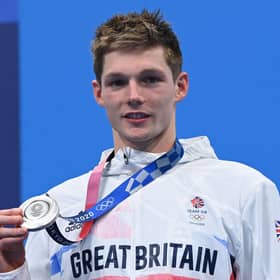 Duncan Scott poses with his silver medal after the final of the men's 200m individual medley