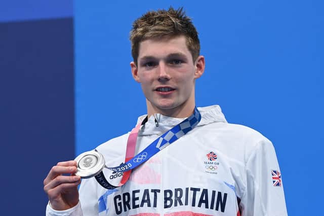 Duncan Scott poses with his silver medal after the final of the men's 200m individual medley