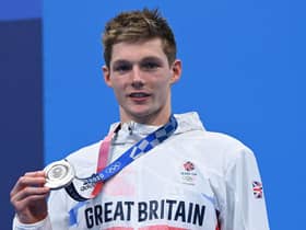 Duncan Scott poses with his silver medal after the final of the men's 200m individual medley
