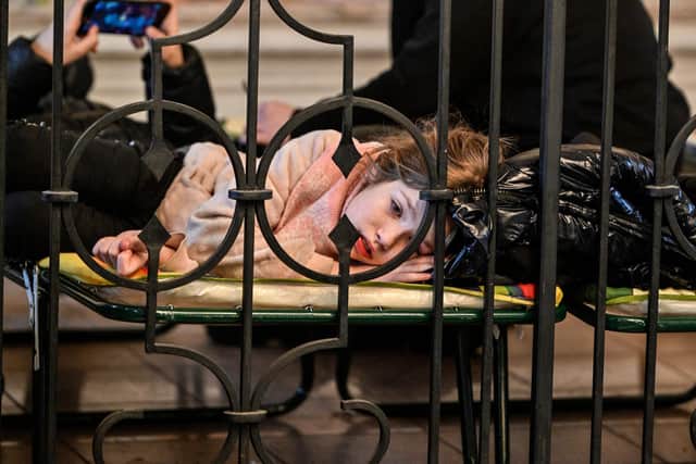 Refugees from Ukraine rest at a temporary shelter in the main train station in Krakow, Poland (Picture: Louisa Gouliamaki/AFP via Getty Images)