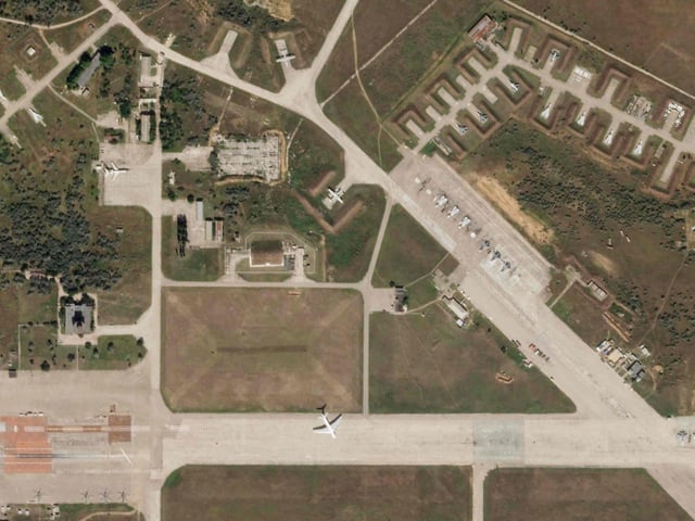 A satellite image by Planet Labs PBC shows aircraft at Saky Air Base before an explosion Tuesday, Aug. 9, 2022, in the Crimean Peninsula, the Black Sea peninsula seized from Ukraine by Russia and annexed in March 2014.