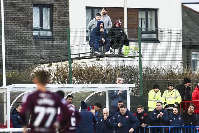 Fans took drastic measures to watch the match. Pic: Lisa Ferguson.