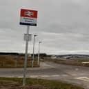 Inverness Airport is reassuringly visible to walkers from its new railway station. Picture: The Scotsman