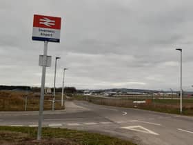 Inverness Airport is reassuringly visible to walkers from its new railway station. Picture: The Scotsman